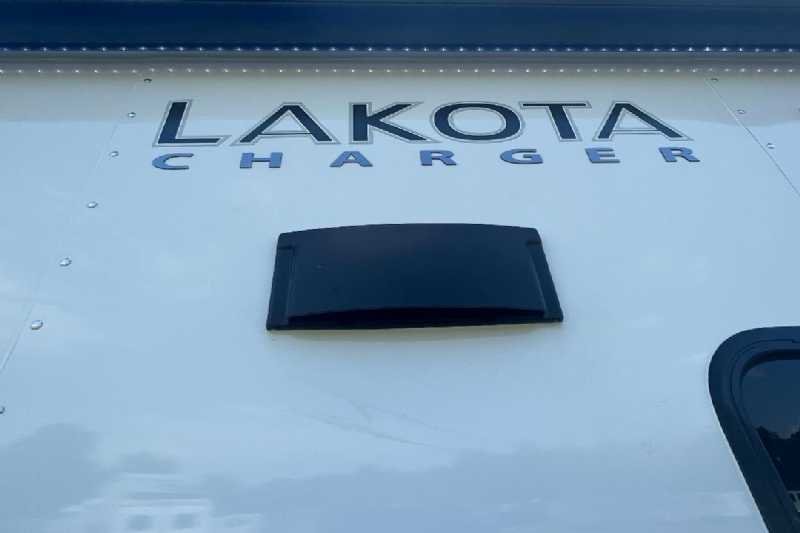 2024 Lakota Charger 8411RKGLQ 4 Horse Trailer with 11′ Short Wall - Image 4